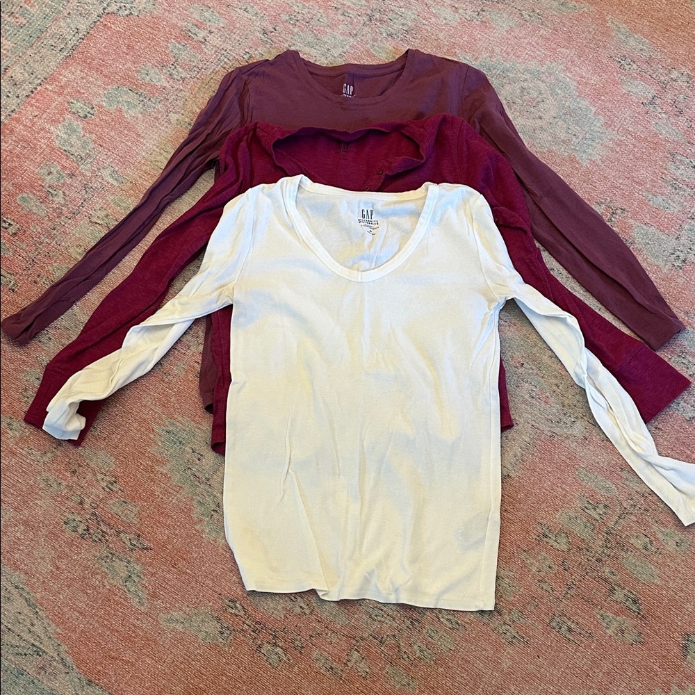 Three long sleeved gap women’s maternity shirts